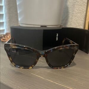 Prada Women’s Tortoiseshell Sunglasses with Dark Lenses